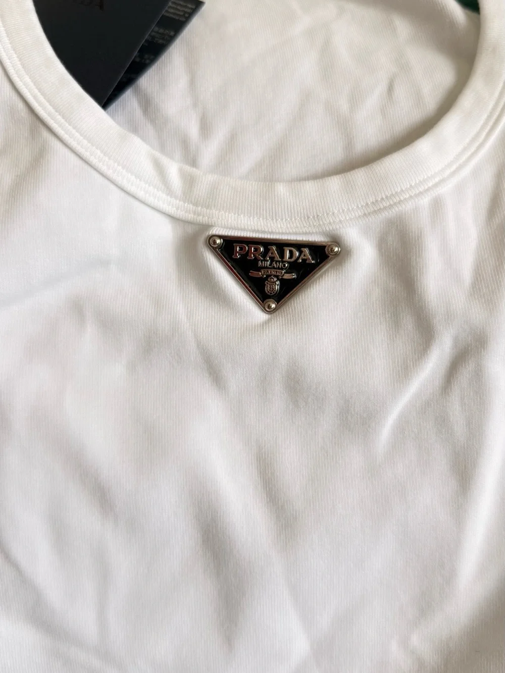 Prada White Tee with Silver-Tone Triangle Plaque